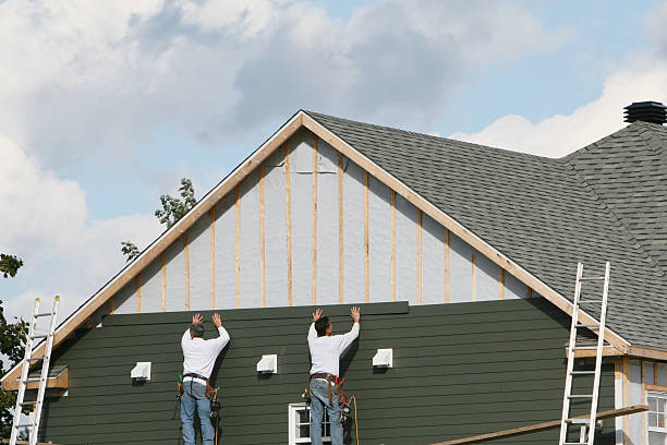 Professional Siding technician working in Waban, MA